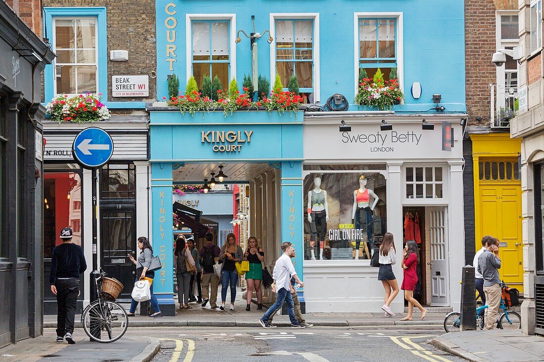 United Kingdom, London, Soho district, Beak Street, fashion shops and entrance of Kimgly Court passage
