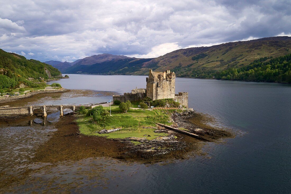 United Kingdom, Scotland, Highland, Dornie, Castle of Eilean Donan at the start of Loch Duich (aerial view)