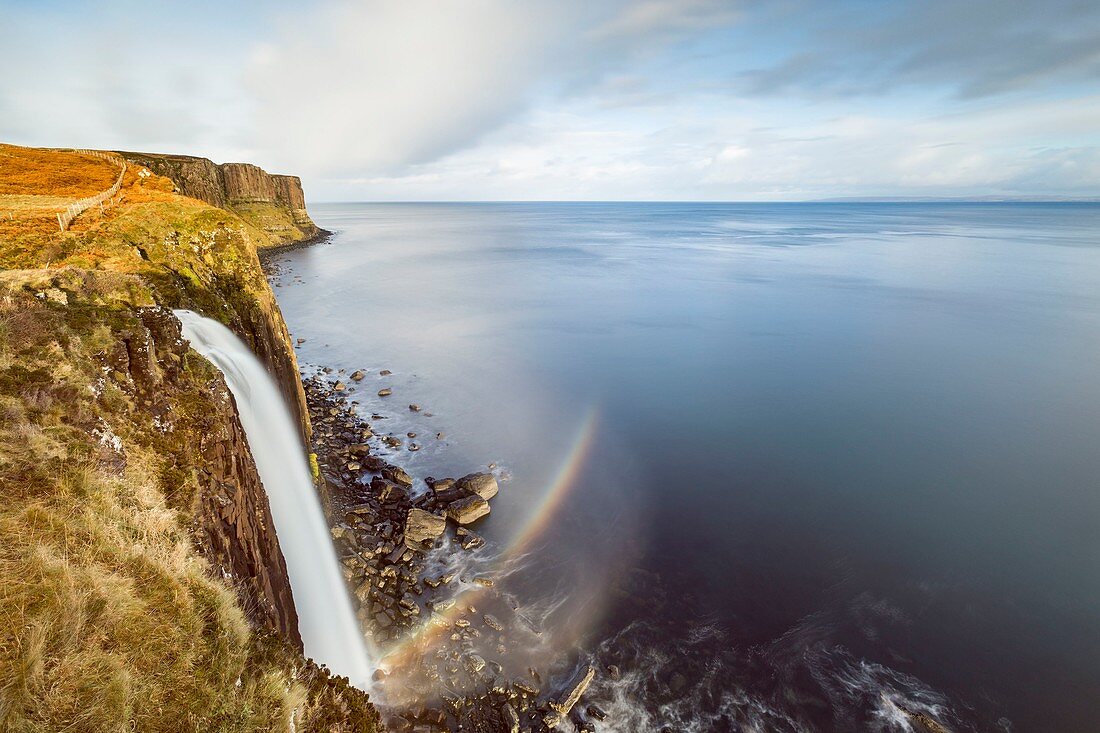 United Kingdom, Scotland, Highlands, Inner Hebrides, Isle of Skye, Trotternish, Staffin, Mealt falls and Kilt Rock in background