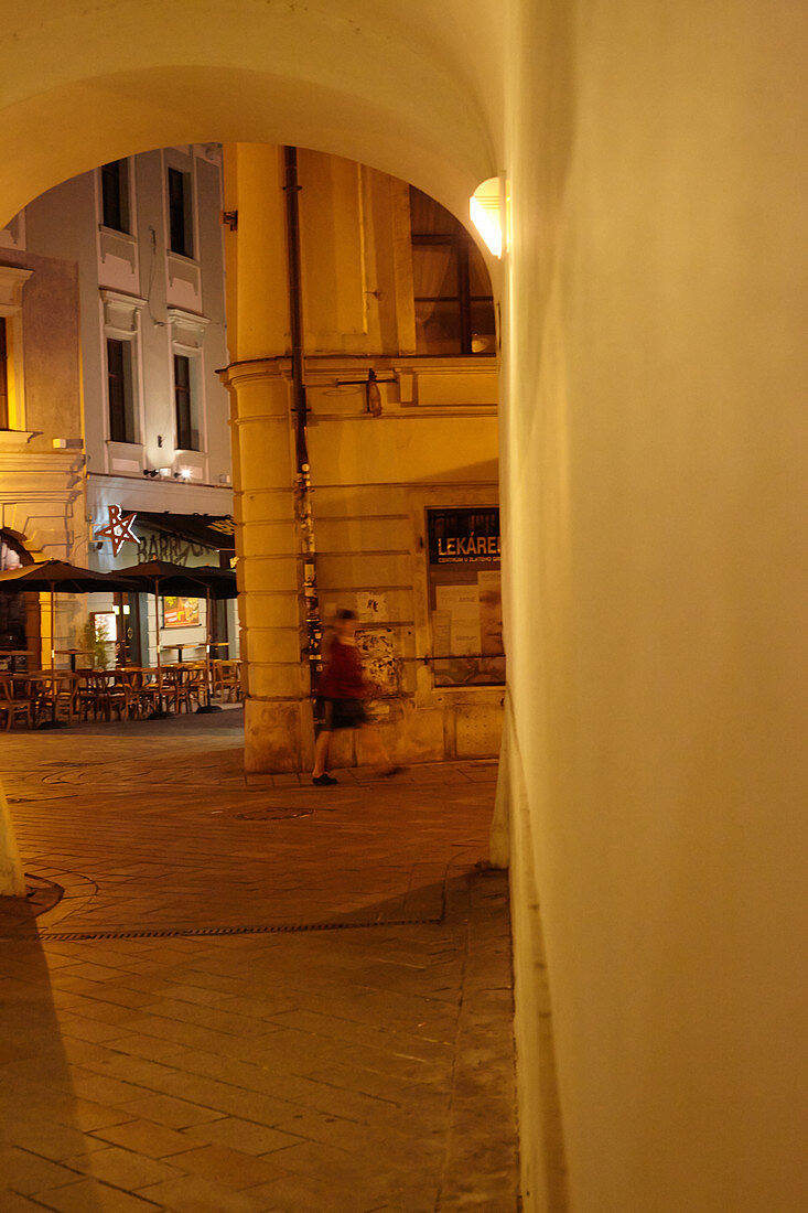 Archway and alley in the old town at night, Bratislava, Slovakia