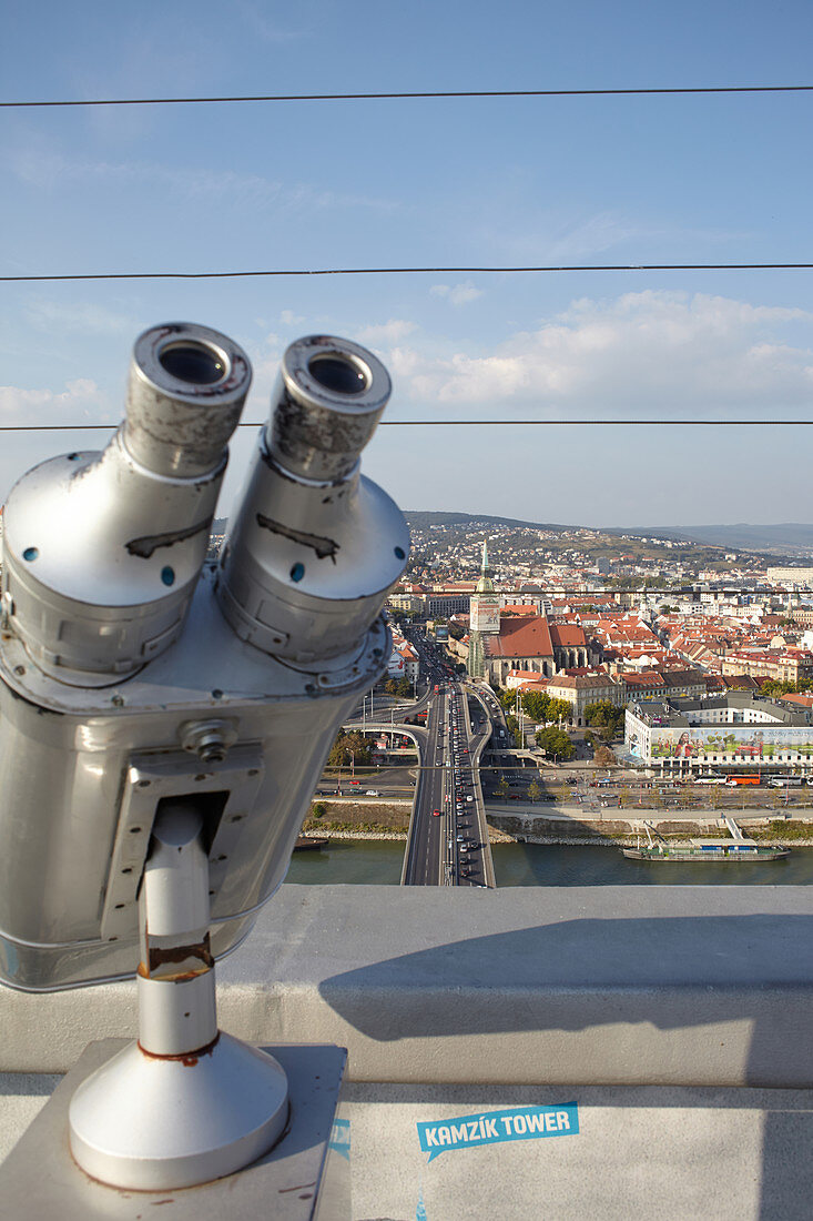 View from UFO observation deck with binoculars, Bratislava, Slovakia.