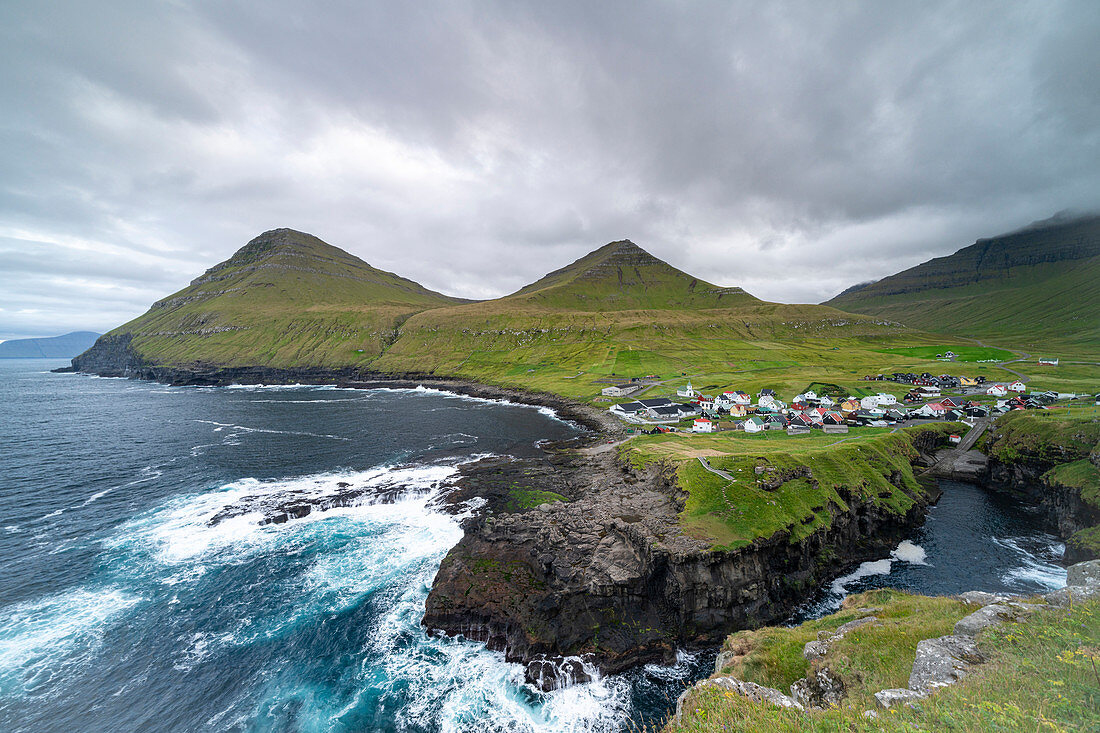 Natural harbor from the fishing village Gjógv with impressive landscape, Gjógv, Faroe Islands