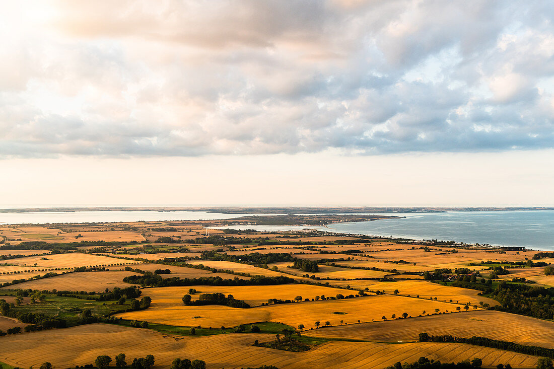 View from the balloon over harvested fields to the island of Fehmarn, Ostholstein, Schleswig-Holstein, Germany