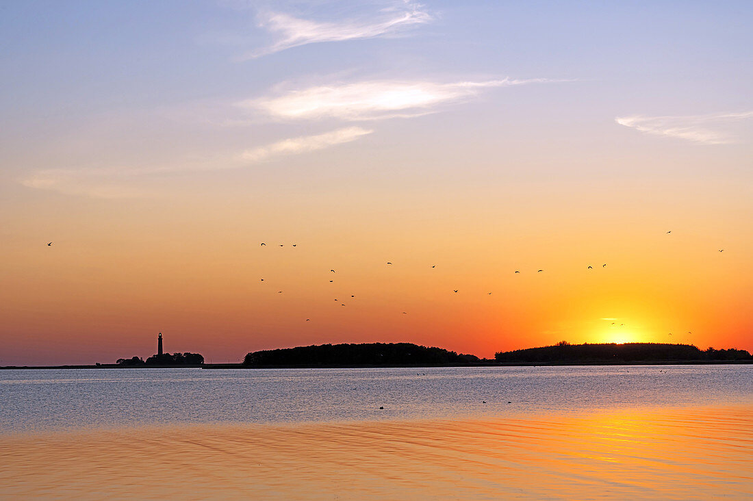 Sunset with a view of the Flügger lighthouse, Ohrt, Fehmarn, Ostholstein, Germany