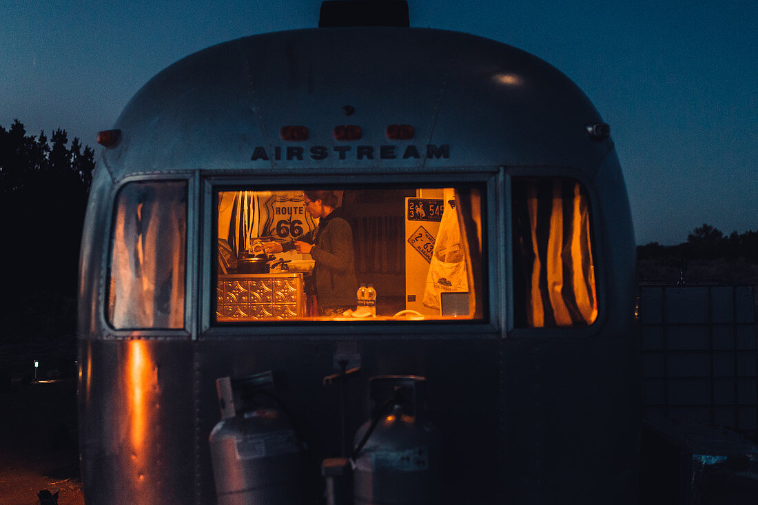 Illuminated Airstream at night in Williams, Flagstaff, Grand Canyon, Arizona, USA, North America