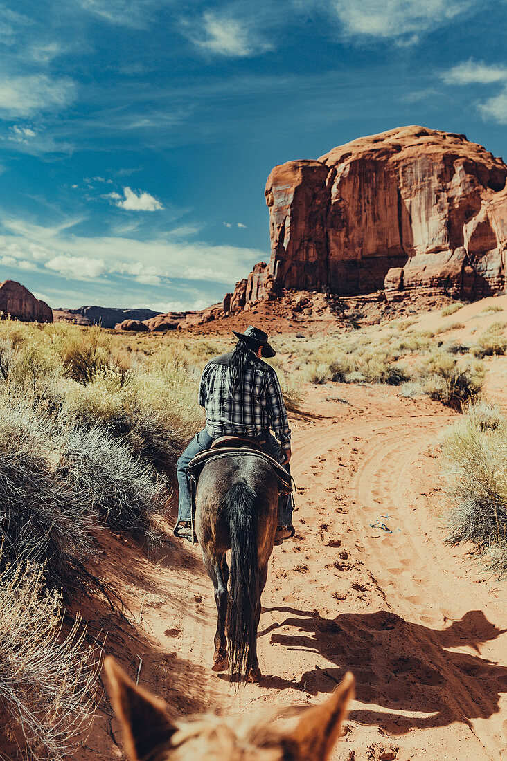 Horseback riding in the Navajo area in Monument Valley, Arizona, Utah, USA, North America