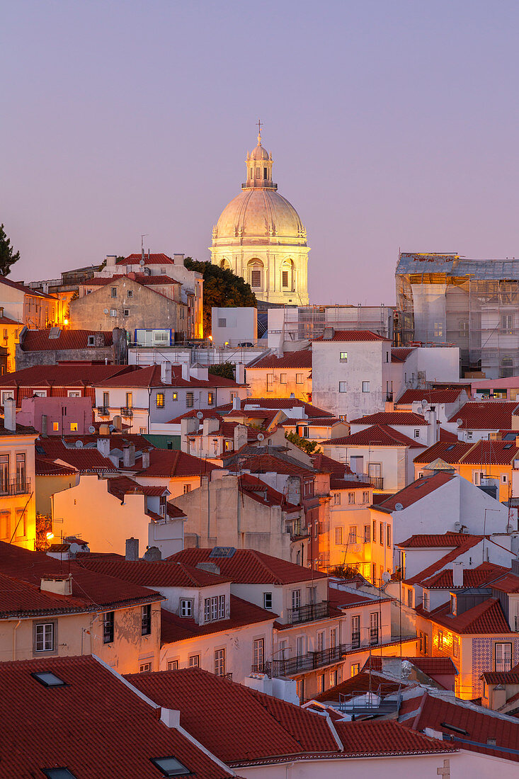 Overview at dusk of the roofs of Alfama Neighborhood with Igreja de Santa Engràcia on the background from Miraduro de Santa Luzia (St Lucy viewpoint), Alfama Neighborhood, Lisbon, Lisbon Metropolitan Area, Portugal