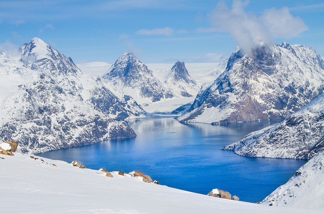 Artic landscape between fjords and snowed mountains in West Coast of Greenland, Artic sea, Denmark