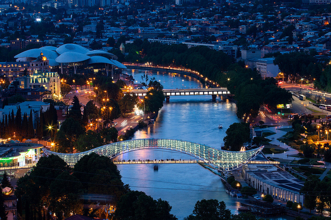 The Kura river and the bridges of Tbilisi by night. Tbilisi, Georgia.