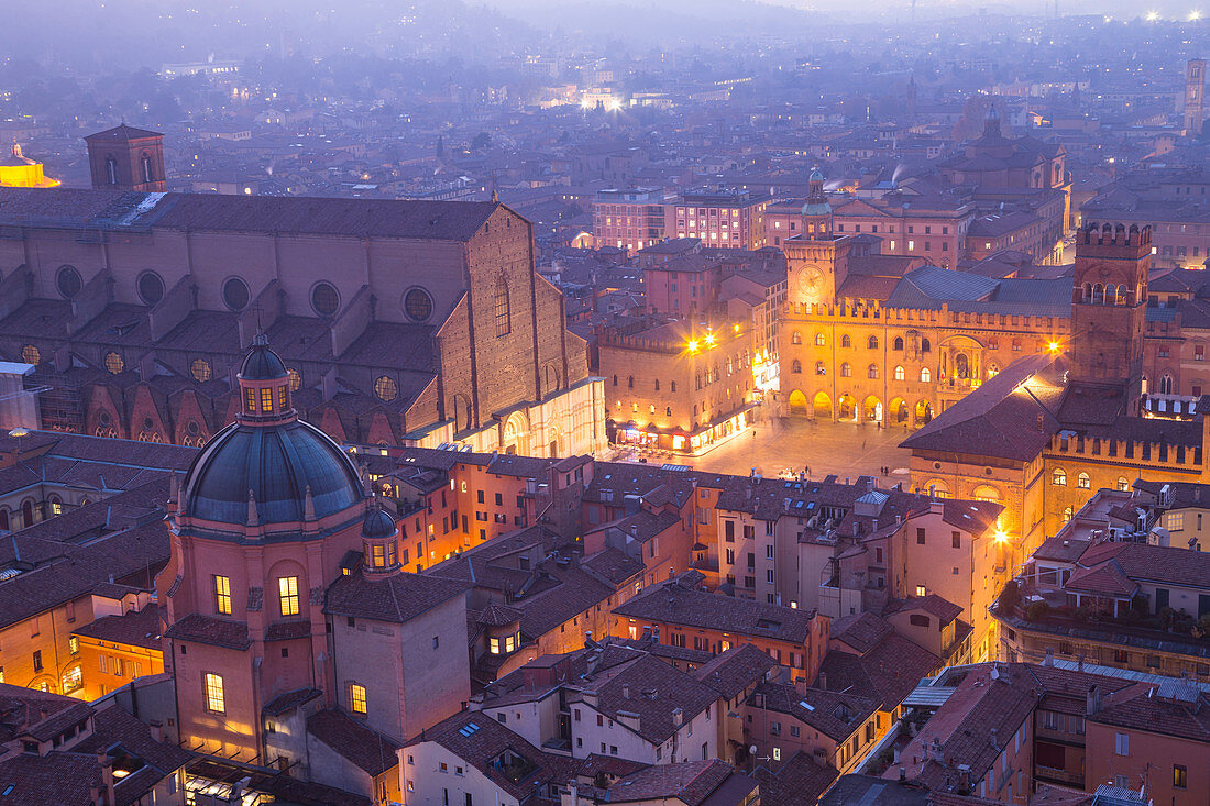 Elevated cityscape of Bologna old town from Asinelli tower by night. Bologna, Emilia Romagna, Italy, Europe.