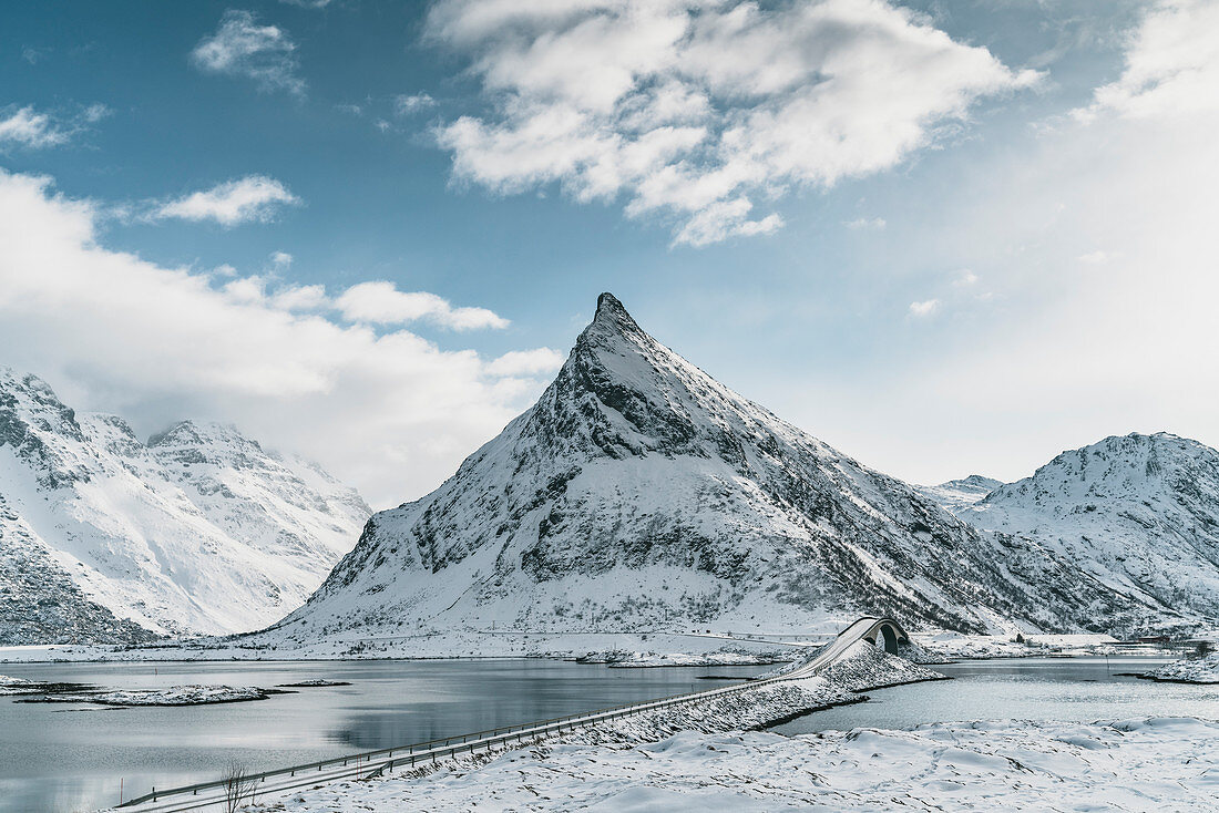 Fredvang Bridge and Volanstind peak in winter. Fredvang, Flakstad municipality, Nordland county, Northern Norway, Norway.