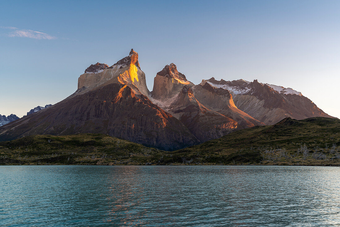Paine Horns and Cerro Paine with Lake Pehoé in the freground at sunset. Torres del Paine National Park, Ultima Esperanza province, Chile.