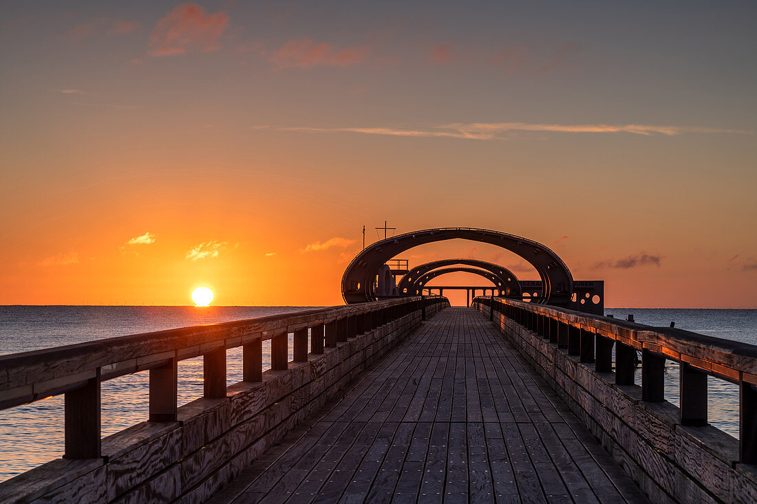 Sunrise on the pier in Kellenhusen, Baltic Sea, Ostholstein, Schleswig-Holstein, Germany