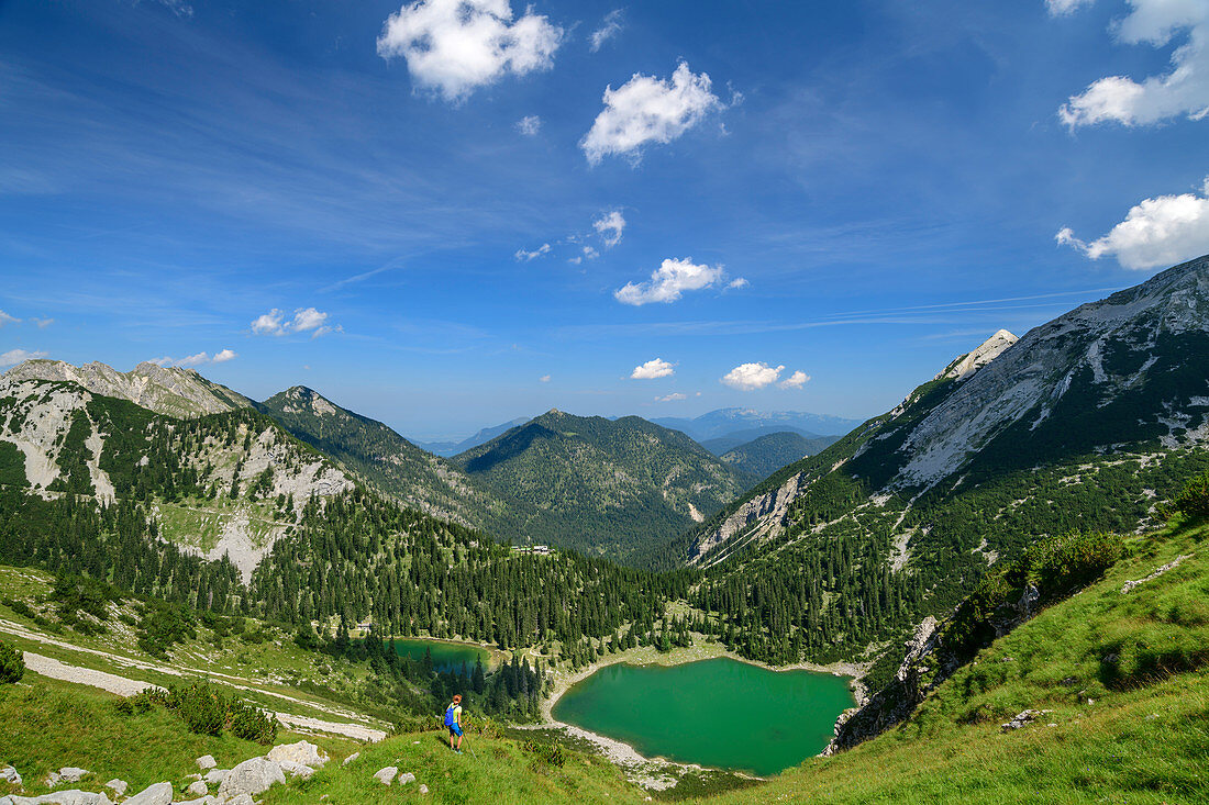 Woman while hiking looks out over Soiernseen, Soiernspitze, Karwendel, Upper Bavaria, Bavaria, Germany