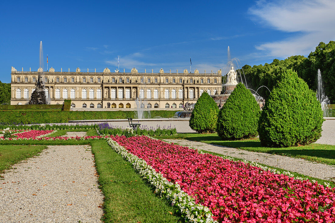 Park with flower borders and Herrenchiemsee Palace, Herrenchiemsee, Chiemsee, Upper Bavaria, Bavaria, Germany