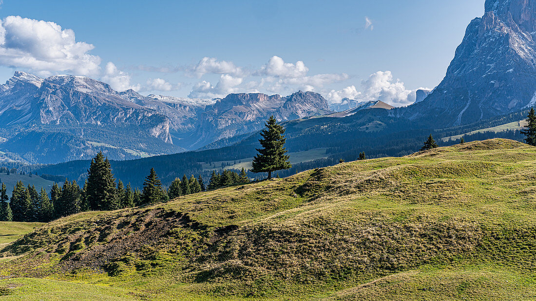 View of the surrounding mountain landscapes on the Alpe di Siusi in South Tyrol, Italy