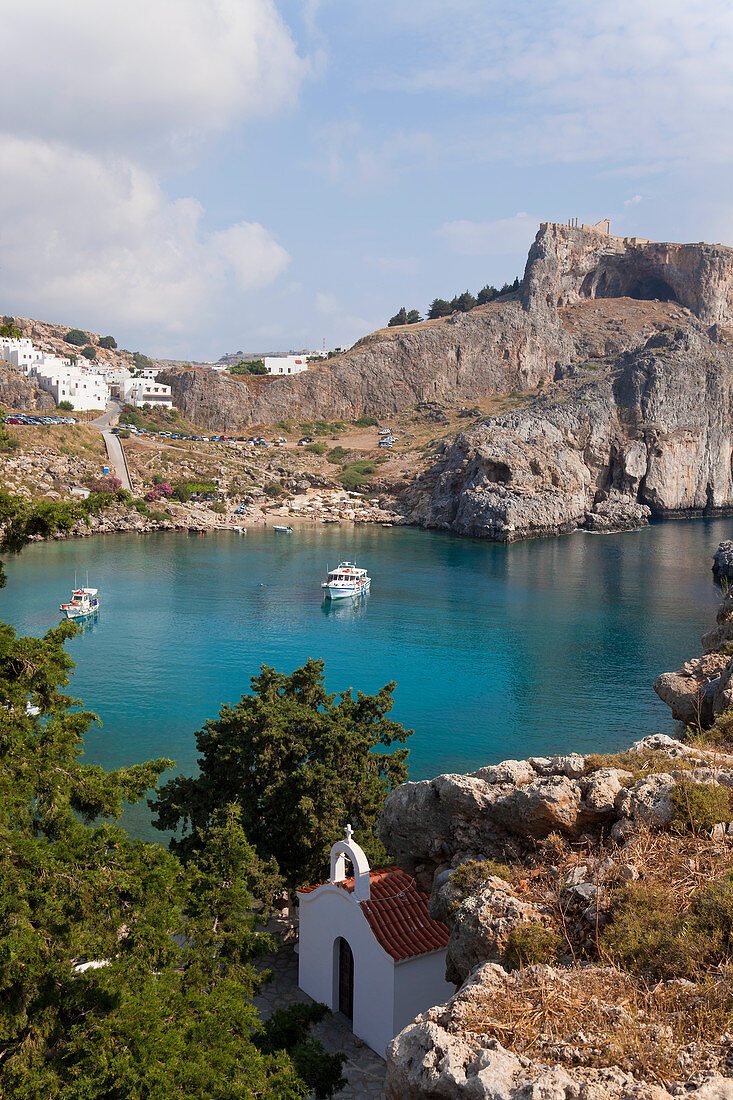 St Pauls Harbour, beach and Acropolis, Lindos Rhodes Greece