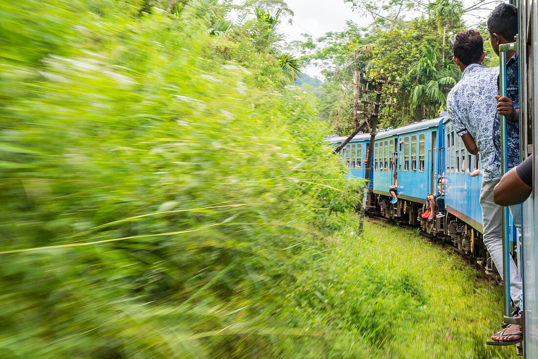 Train journey from Kandy up to southern highlands and tea estates, Sri Lanka