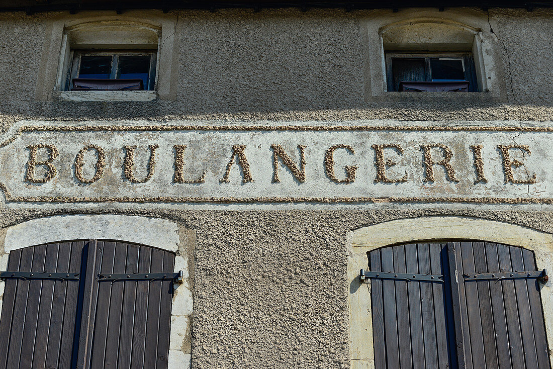 Old lettering Boulangerie on the facade of a house in Liverdun on the Moselle, France