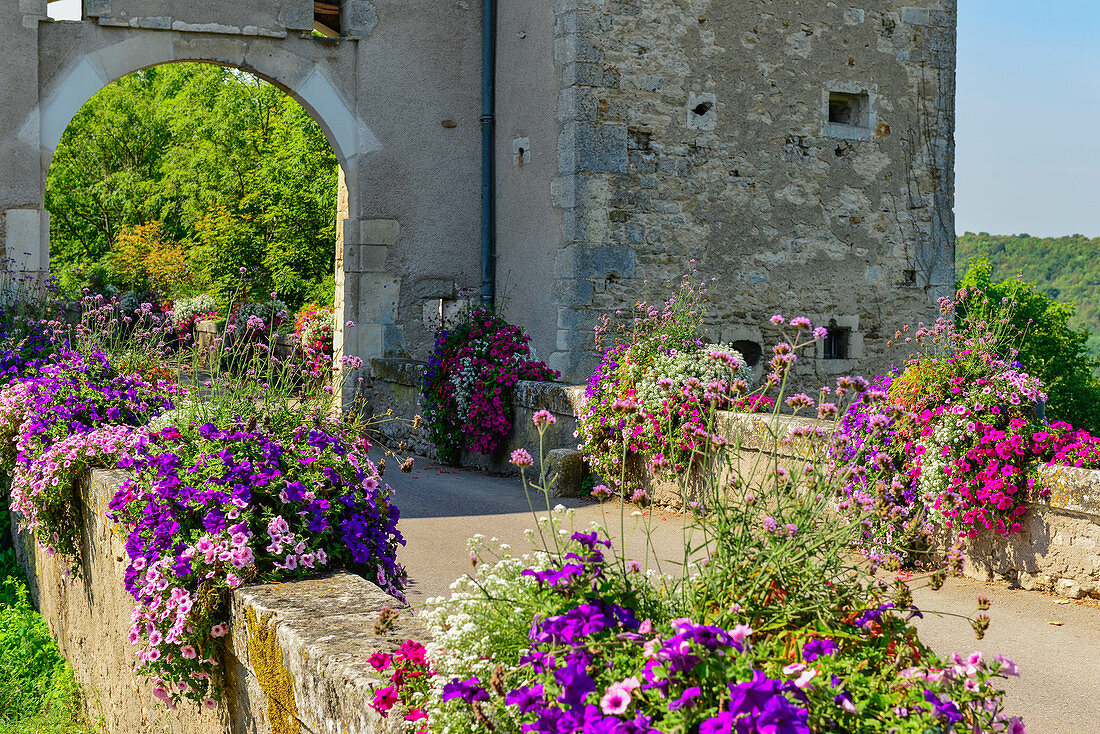 Colorful flowers at the city gate in Liverdun on the Moselle, France