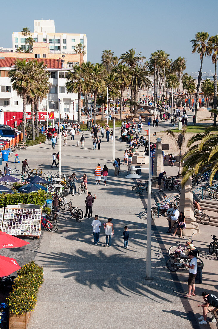 Santa Monica ocean front walk with people strolling along, Los Angeles, California, USA