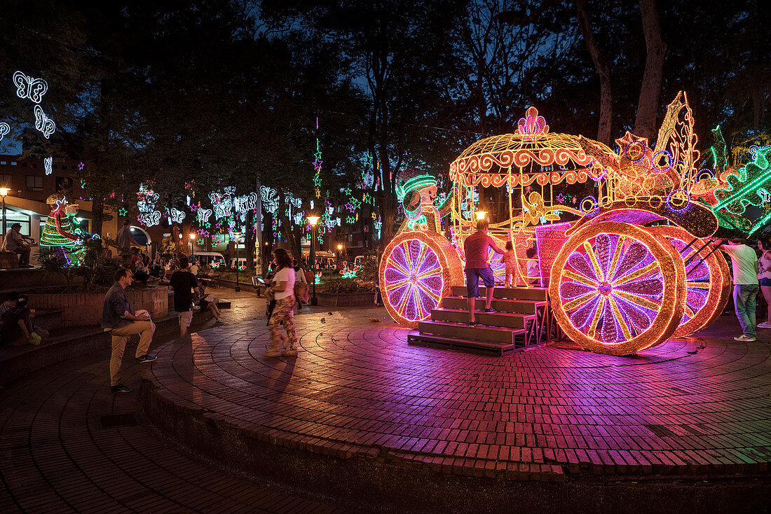 Christmas decorated and illuminated park with carriage, Medellin, Colombia, South America