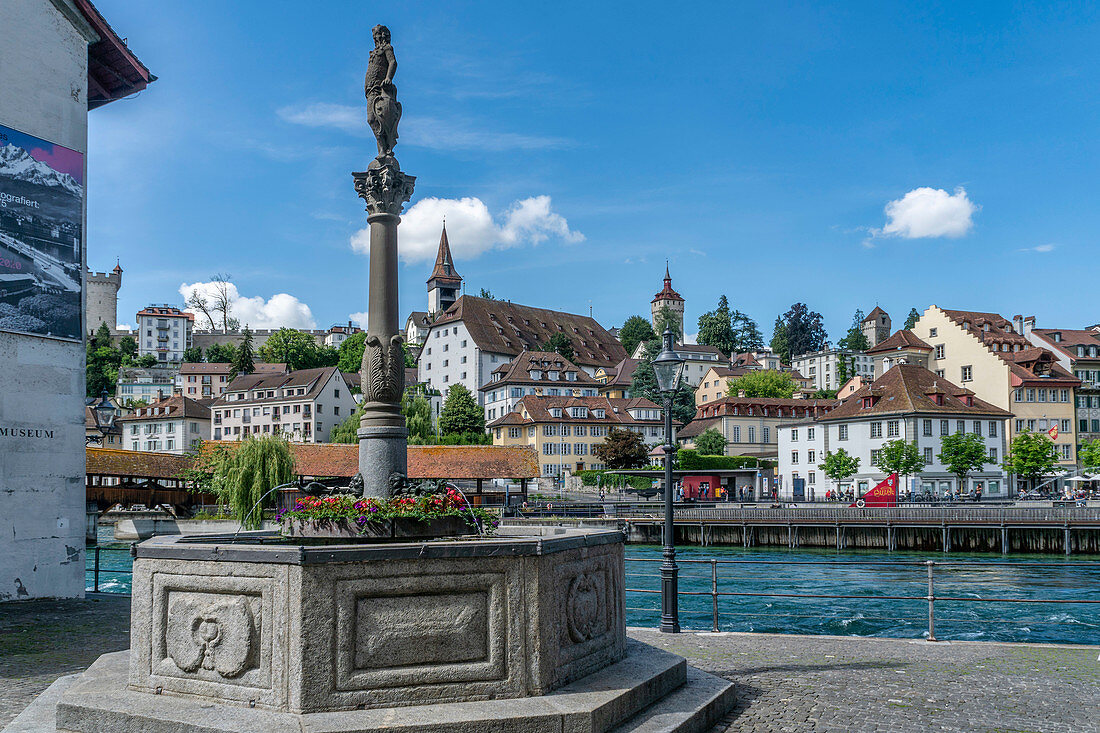 Fountain on the Reuss River in Lucerne, Switzerland | Panorama Lucerne, river Reuss, Switzerland