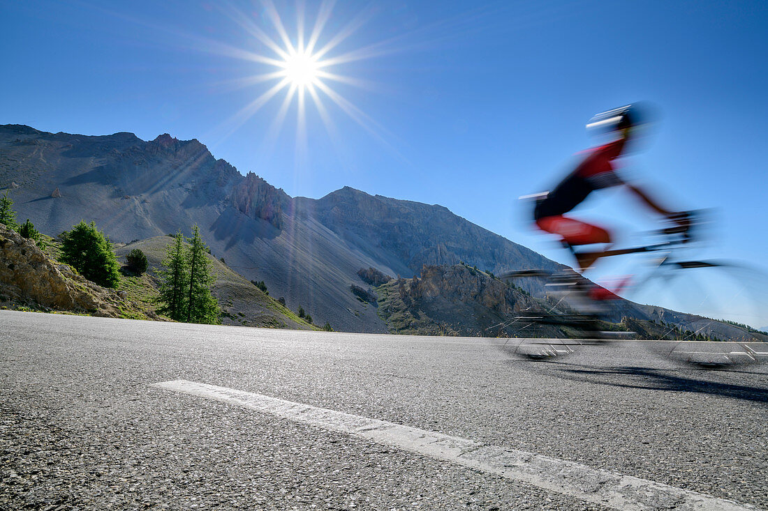 Cyclists out of focus in the descent at Col d´Izoard, Col d´Izoard, Cottian Alps, Hautes-Alpes, France