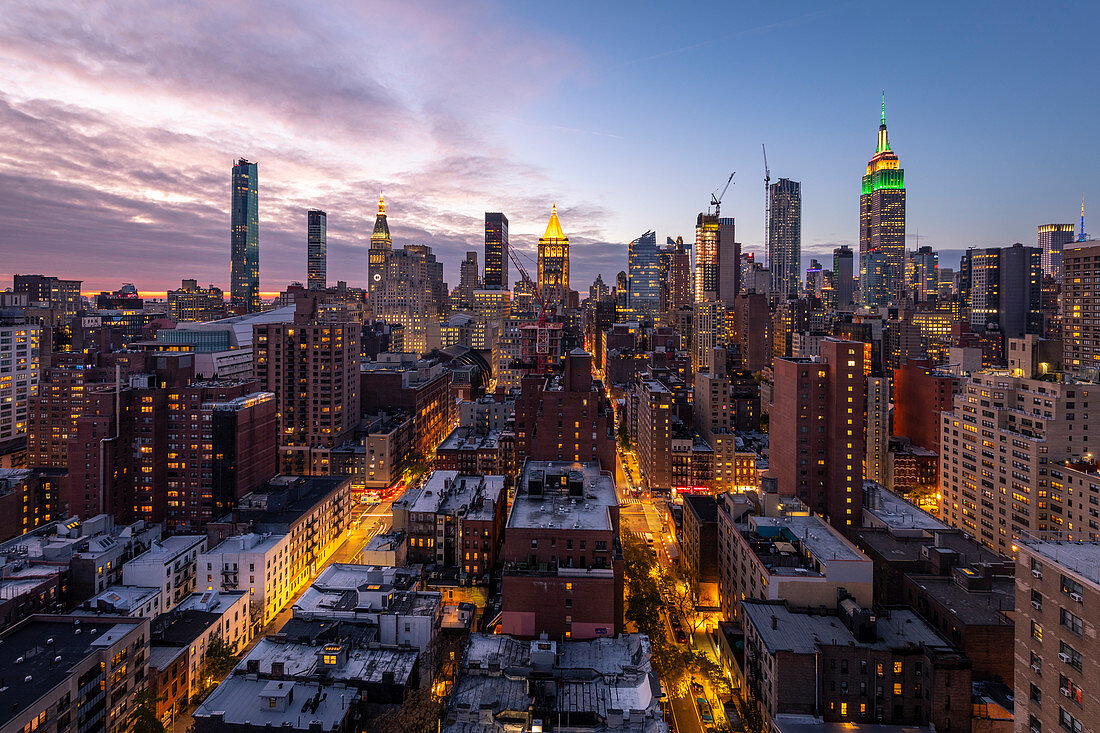 Manhattan  Skyline during sunset with Empire State Building. New York, USA.