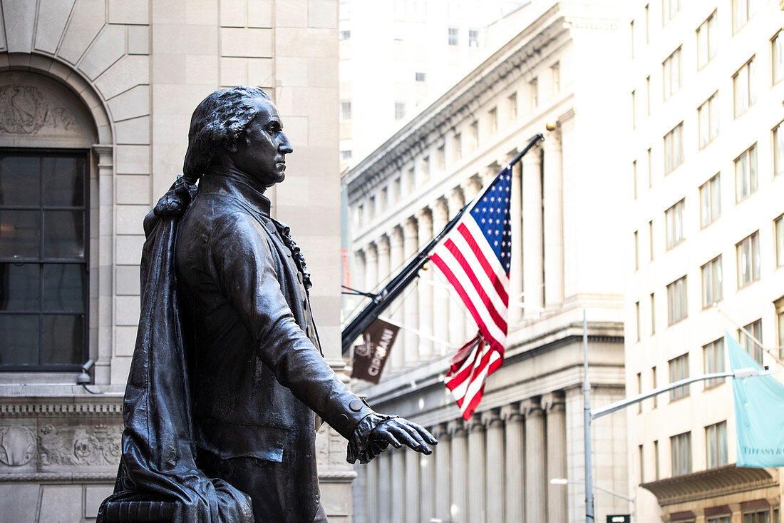 External view of Wall Street and New York Stock Exchange with George Washington statue. Manhattan, New York, USA