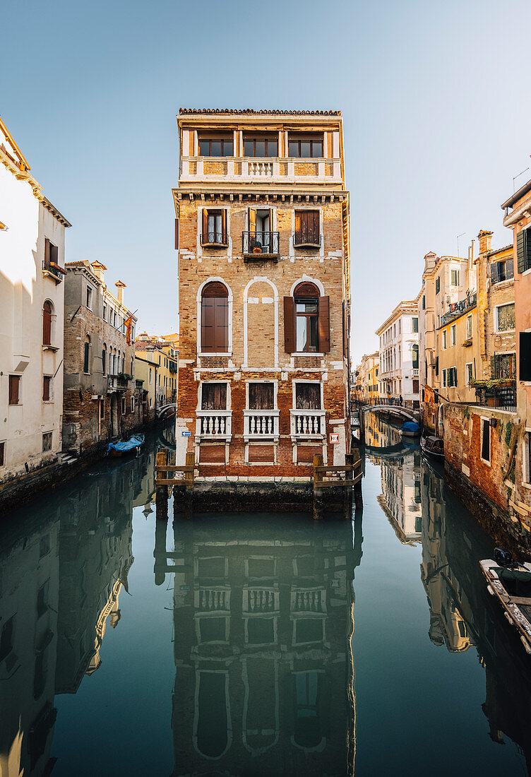 A palace between two canals in Venice, Veneto, Italy.