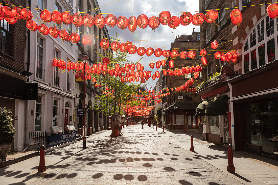 View of empty street in Chinatown decorated with red lanterns during the Corona virus crisis