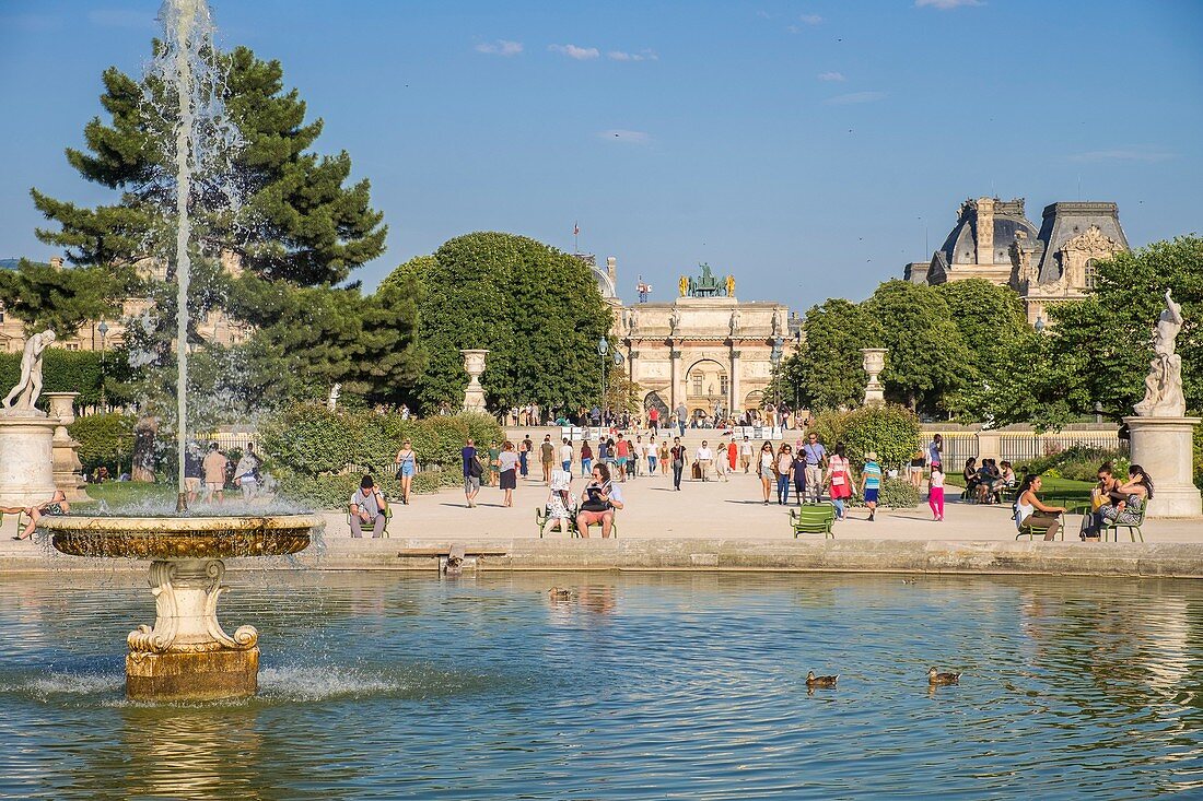 France, Paris, Jardin des Tuileries, the large round basin and the carroussel du Louvre at the bottom