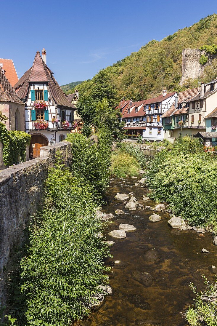 France, Haut Rhin, Route des Vins d'Alsace, Kaysersberg , the half timbered houses lining the river Weiss since the strengthened bridge