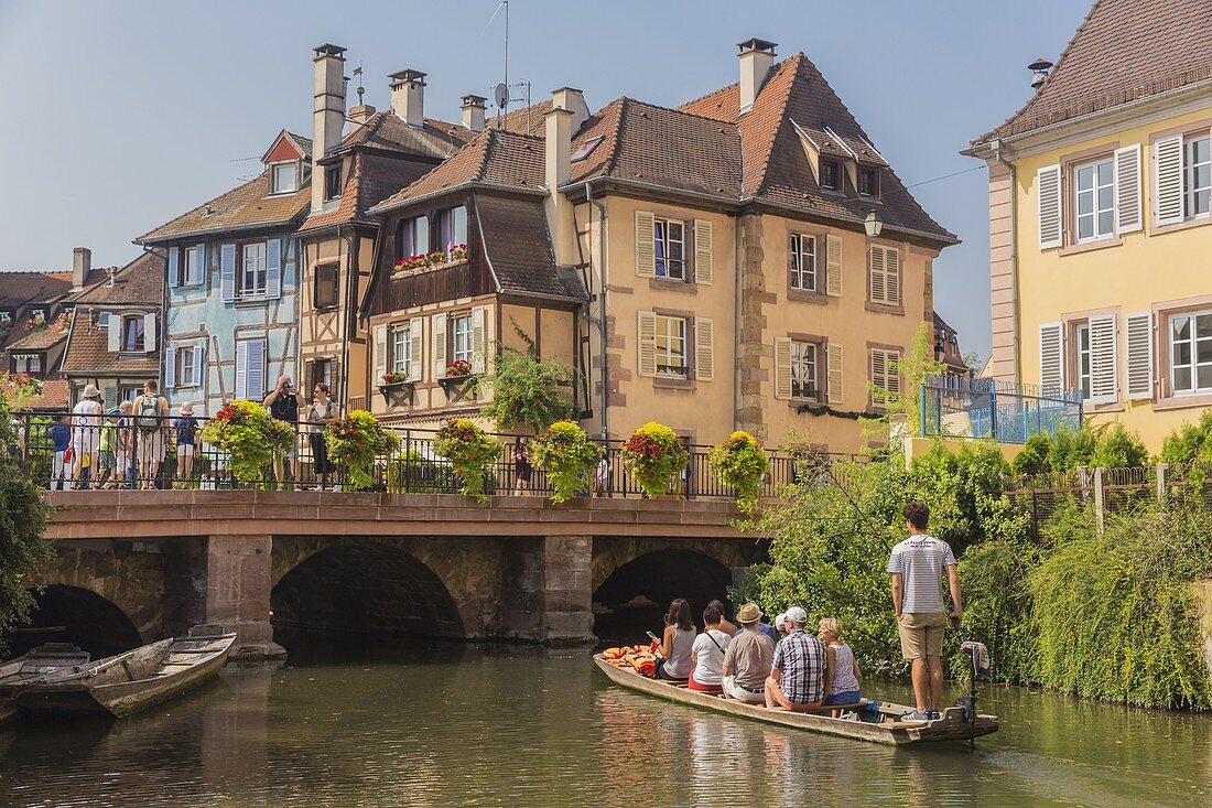 France, Haut Rhin, Alsace Wine Route, Colmar, Krutenau district in La Petite Venise district, quay of the Poissonerie, stroll in boat on Le Lauch