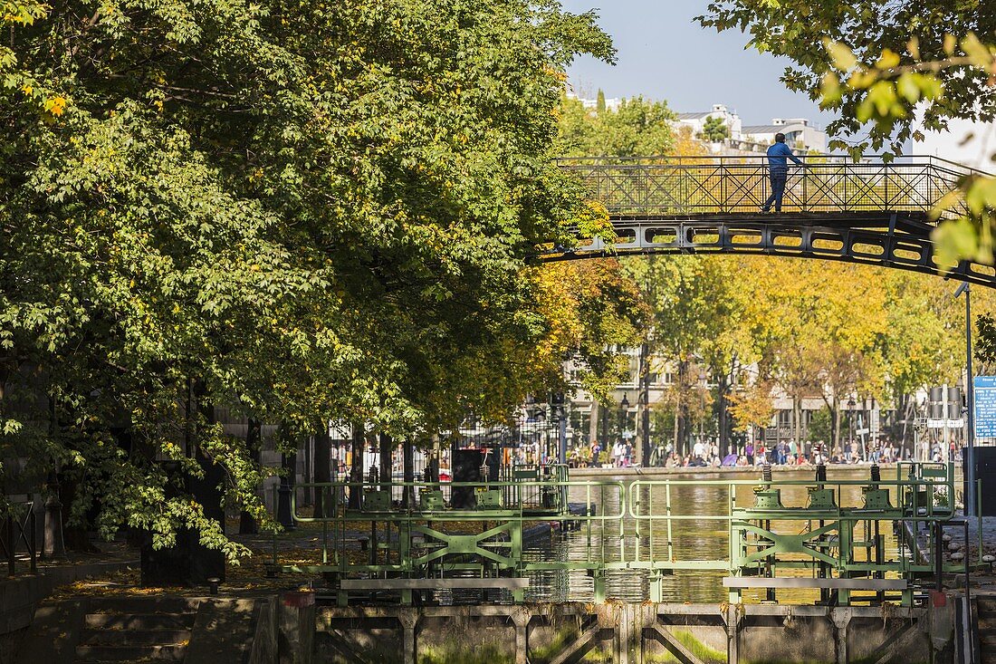 France, Paris, Bassin de la Villette, the largest artificial body of water in Paris, lock that links the Canal de l'Ourcq to the Canal Saint-Martin, cruise on the canals