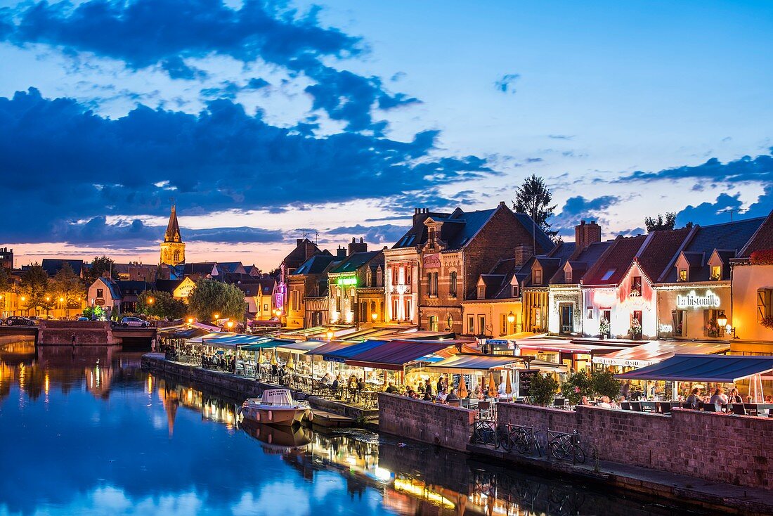 France, Somme, Amiens, Saint Leu district, Quai Belu on the banks of the Somme river at dusk