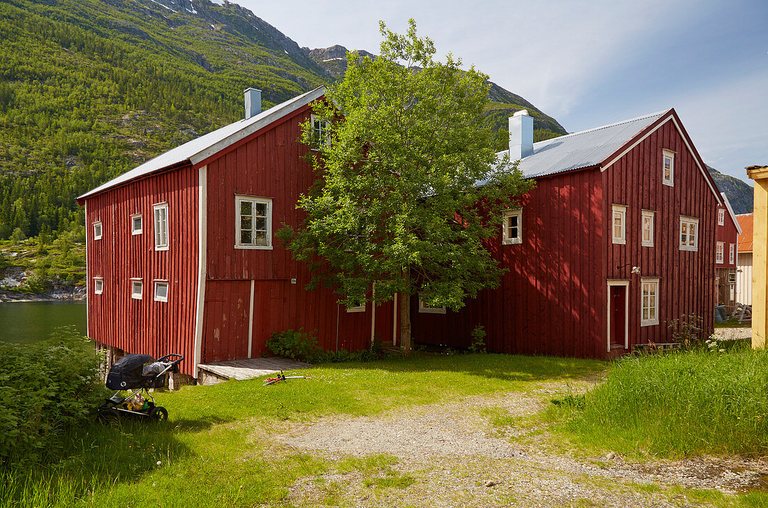 Wooden houses by the Vefsnfjord in Mosjoen, Nordland, Norway, Europe