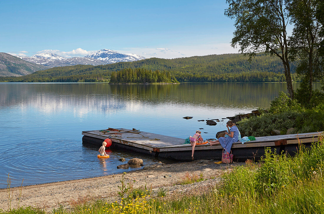 Bathing at Lake Fustvatnet near Mosjoen, Nordland, Norway, Europe