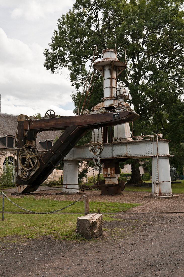 Crane and machinery at the royal forge of La Chaussade in Guerigny was built in1640 and is a listed historic monument, Nievres (58), Burgundy, France. Using hydraulic energy from the nearby river, anchors for the Navy were manufactured from 1872.