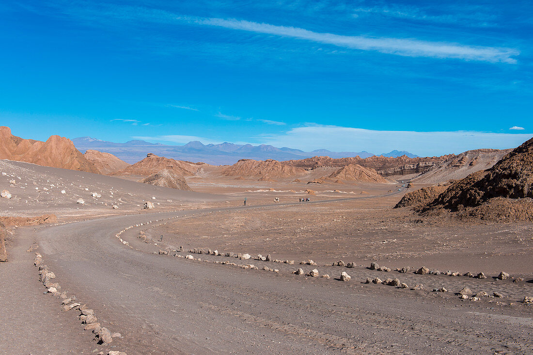The road through the Valley of the Moon near San Pedro de Atacama in the Atacama Desert, northern Chile.