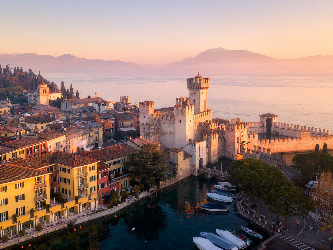 Aerial view at dawn of Sirmione village in Garda lake, Lombardy district, Brescia province, Italy, Europe.