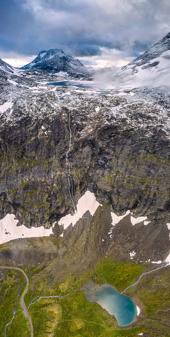 Aerial panoramic of Hornvatnet lake and the rocky mountains of Venjesdalen valley, Andalsnes, More og Romsdal county, Norway