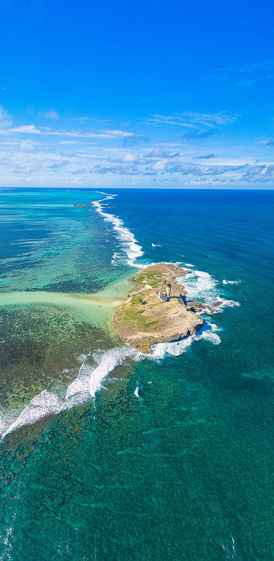 Aerial panoramic of Ile au Phare (Ile Aux Fouquets) in between tropical lagoon and Indian Ocean, Mahebourg, Grand Bay, Mauritius