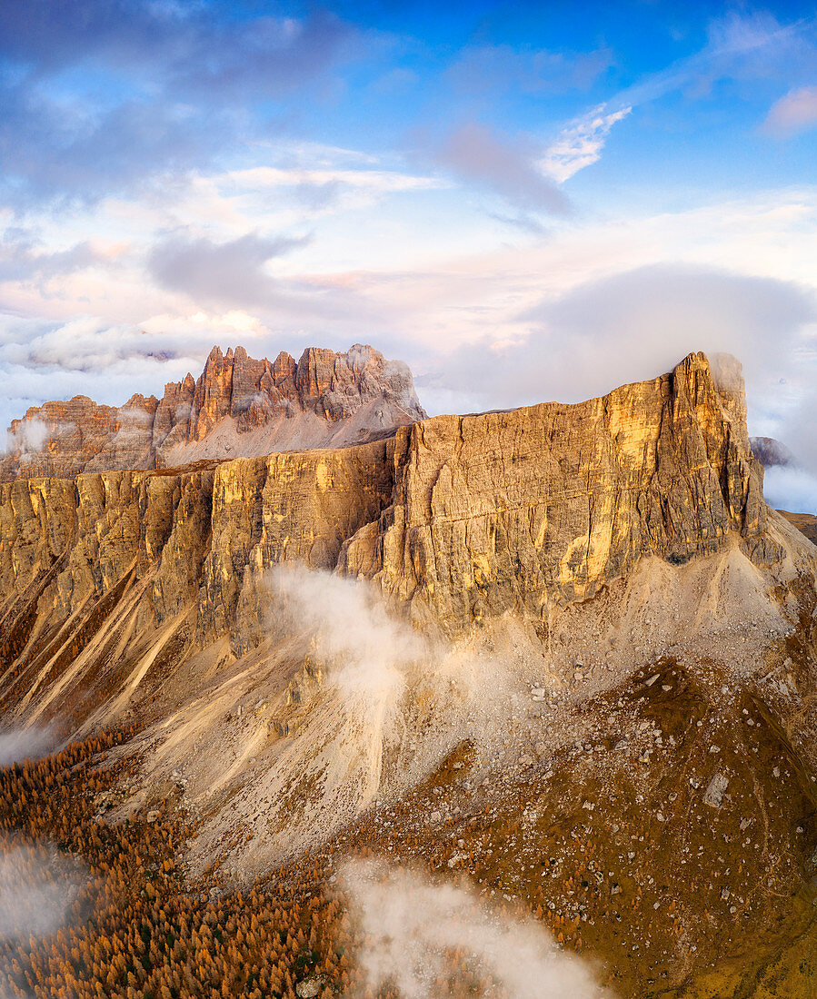 Sunset over Lastoi De Formin and Cima Ambrizzola in autumn, aerial view, Giau Pass, Dolomites, Belluno province, Veneto, Italy