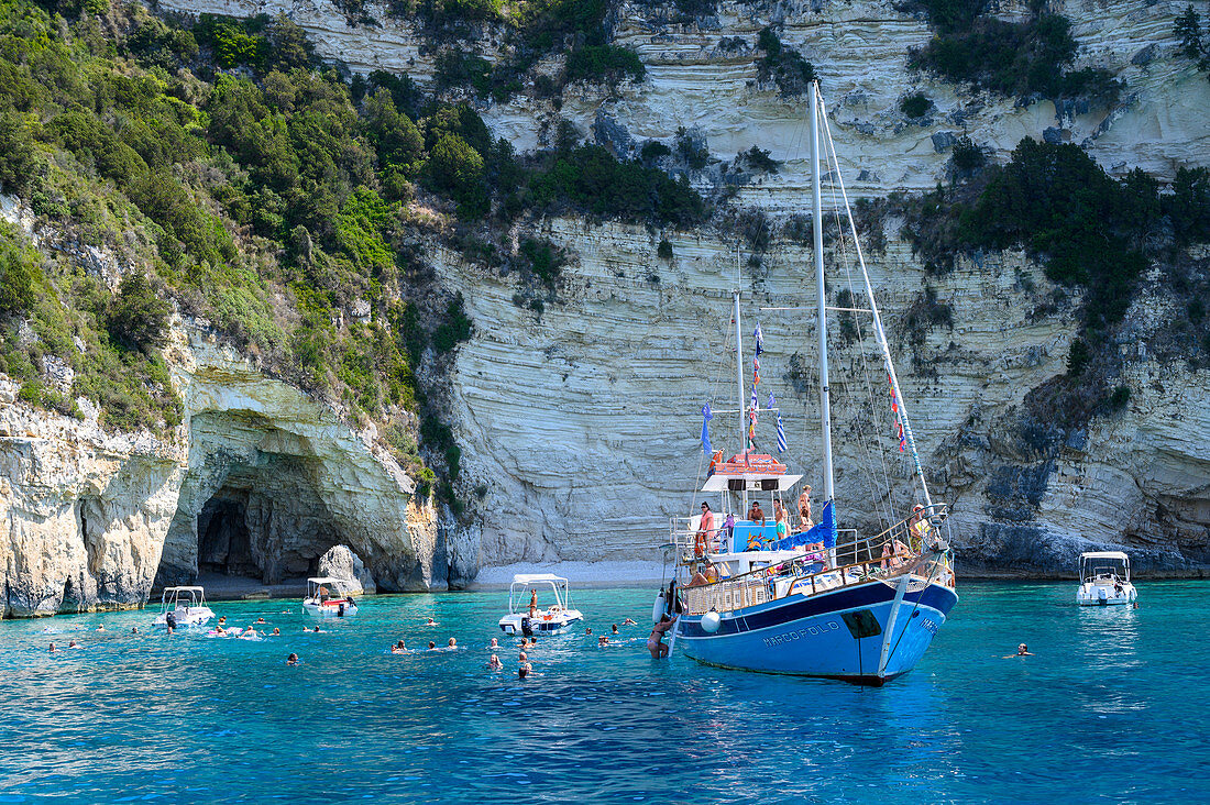 Tourist boats at the Blue Caves, Paxos, Ionian Islands, Greek Islands, Greece, Europe