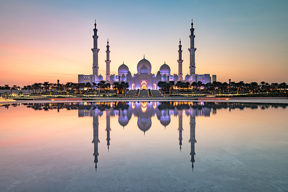 Abu Dhabi's magnificent Grand Mosque viewed in a reflecting pool, Abu Dhabi, United Arab Emirates, Middle East