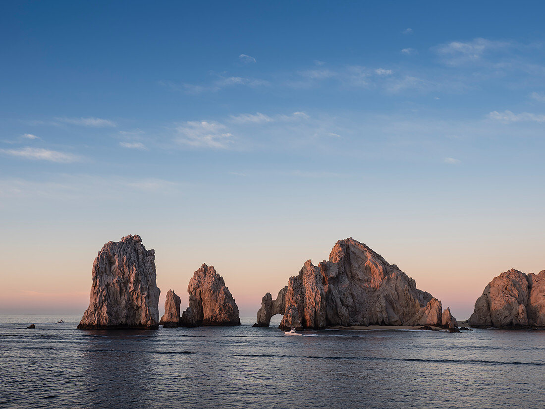 Sunrise light paints Lands End at Cabo San Lucas, Baja California Sur, Mexico, North America