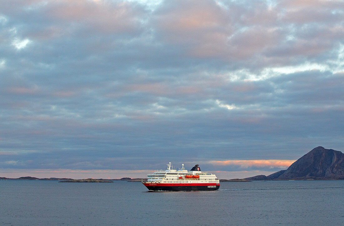 Hurtigruten ship Richard With in front of the island Bolga in the Rödöyfjorden, Rödöyfjord, Roedoeyfjorden, Roedoeyfjord, Helgeland coasts, Nordland province, Salten, Norway, Europe