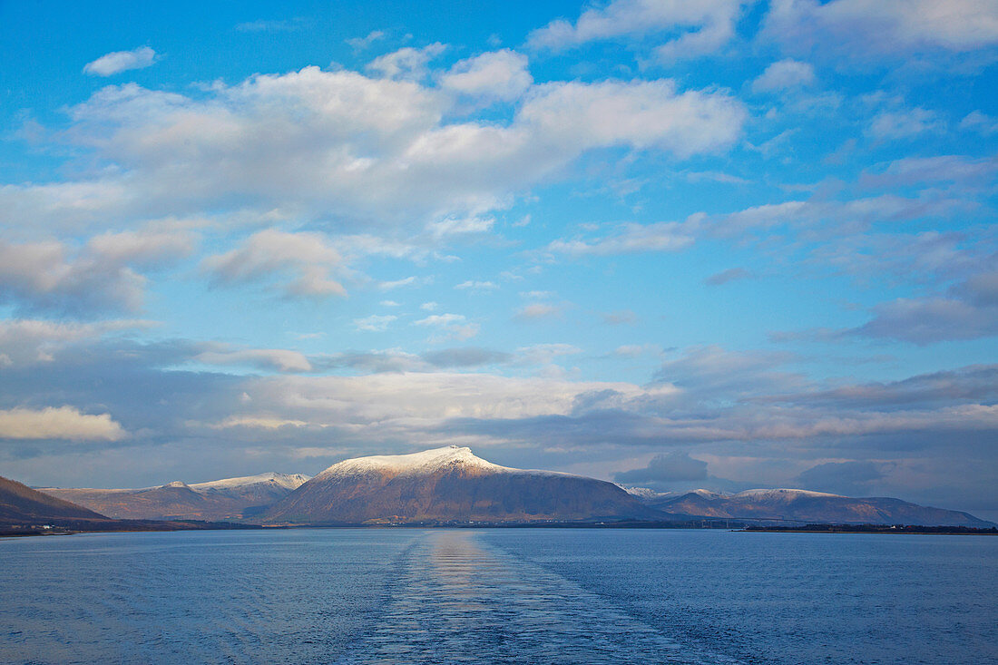 Snow-covered mountains near Risöyhamn, Risöysundet, Vesteralen, Andöya, Nordland, Norway, Europe